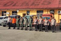 Kodim 1710/Mimika Bersama Polres Mimika Laksanakan Apel Gelar Pasukan Pengamanan Tahun Baru 2025